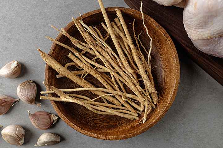Astragalus root in a bowl on a table