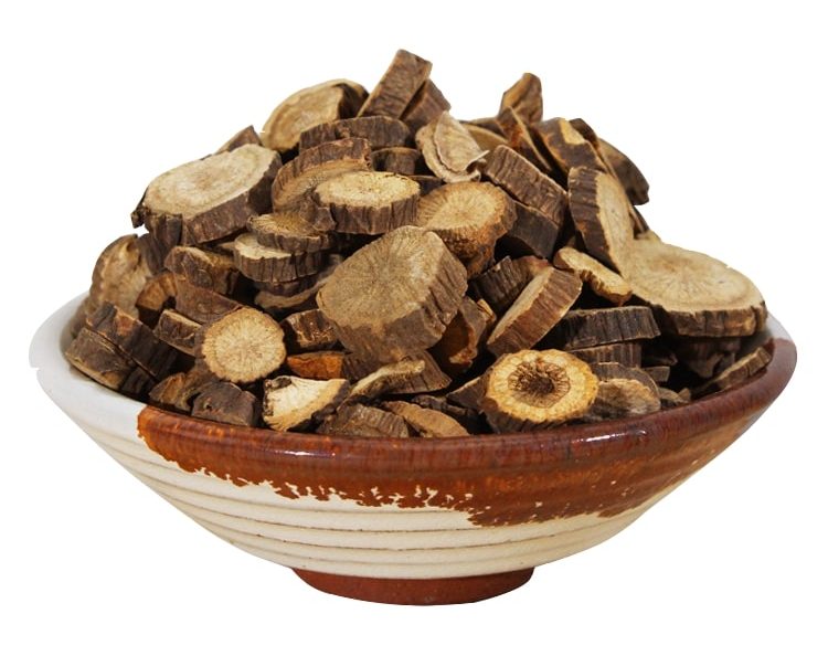 Red Peony Root (Chi Shao) slices in a bowl