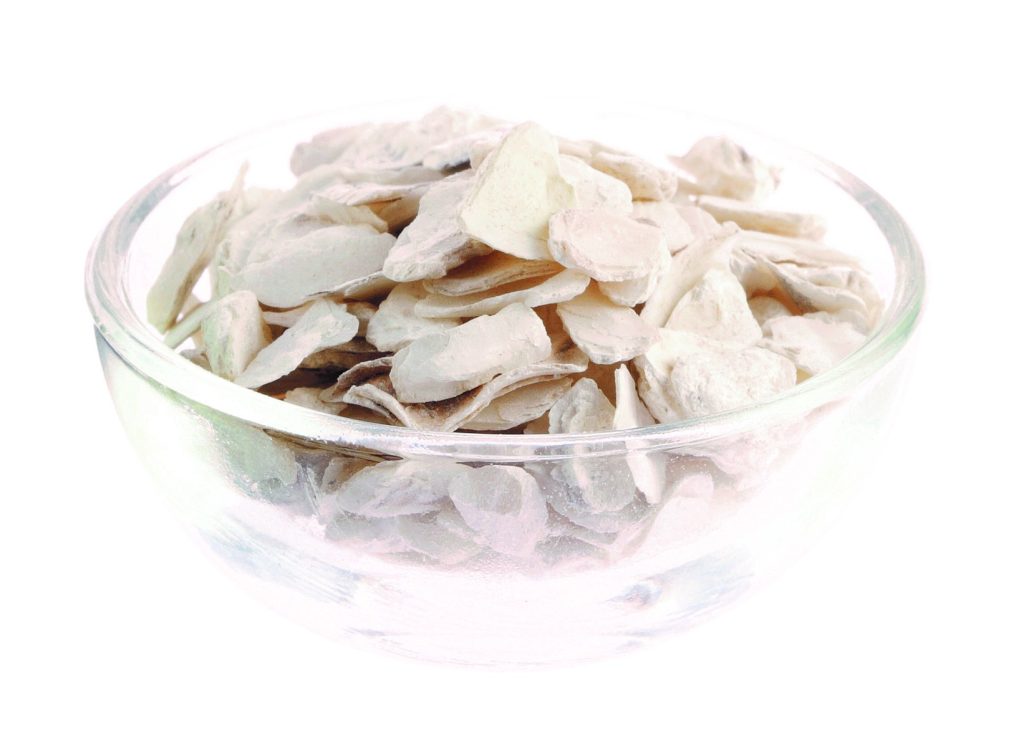 Close up of Oyster Shell (Mu Li) in a glass bowl