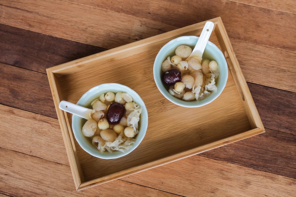 top down view of herbal soup with Chinese lotus seeds, lily bulbs, and white fungus